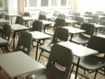 room of empty school desks and chairs