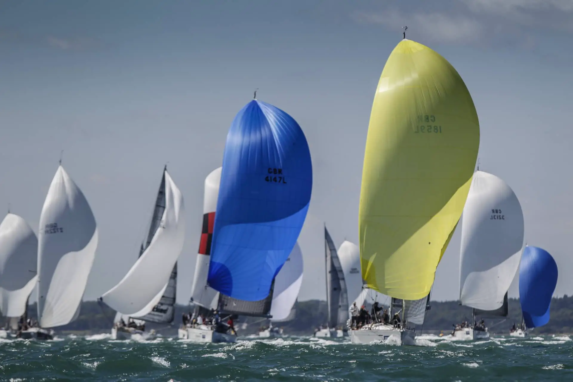 Boats racing on the water during Cowes Week