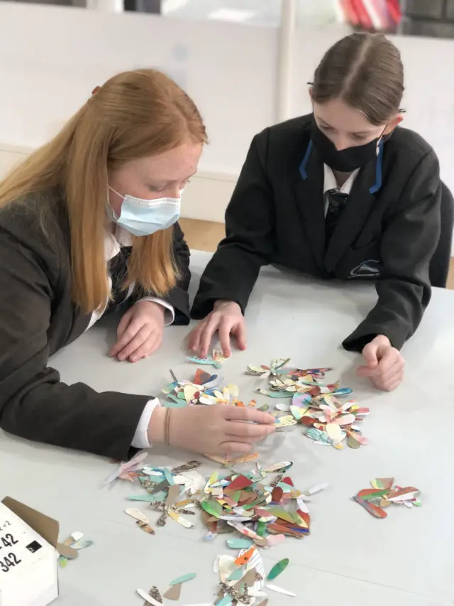 Carisbrooke College students working with Trudie Wilson for the First Marks exhibition