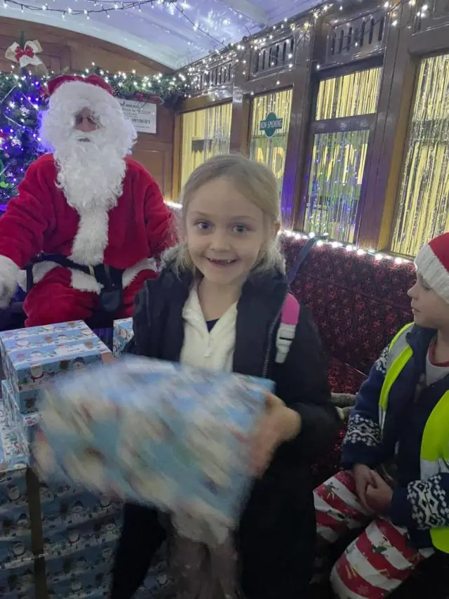 Lanesend Pupils getting presents from Santa