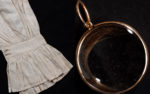 Embroidered cuff of a shirt reputed to have been worn by Charles I at his execution and a lock of hair taken from the body of Charles I when it was exhumed in the 19th century. © The Ashburnham Heritage Trust
