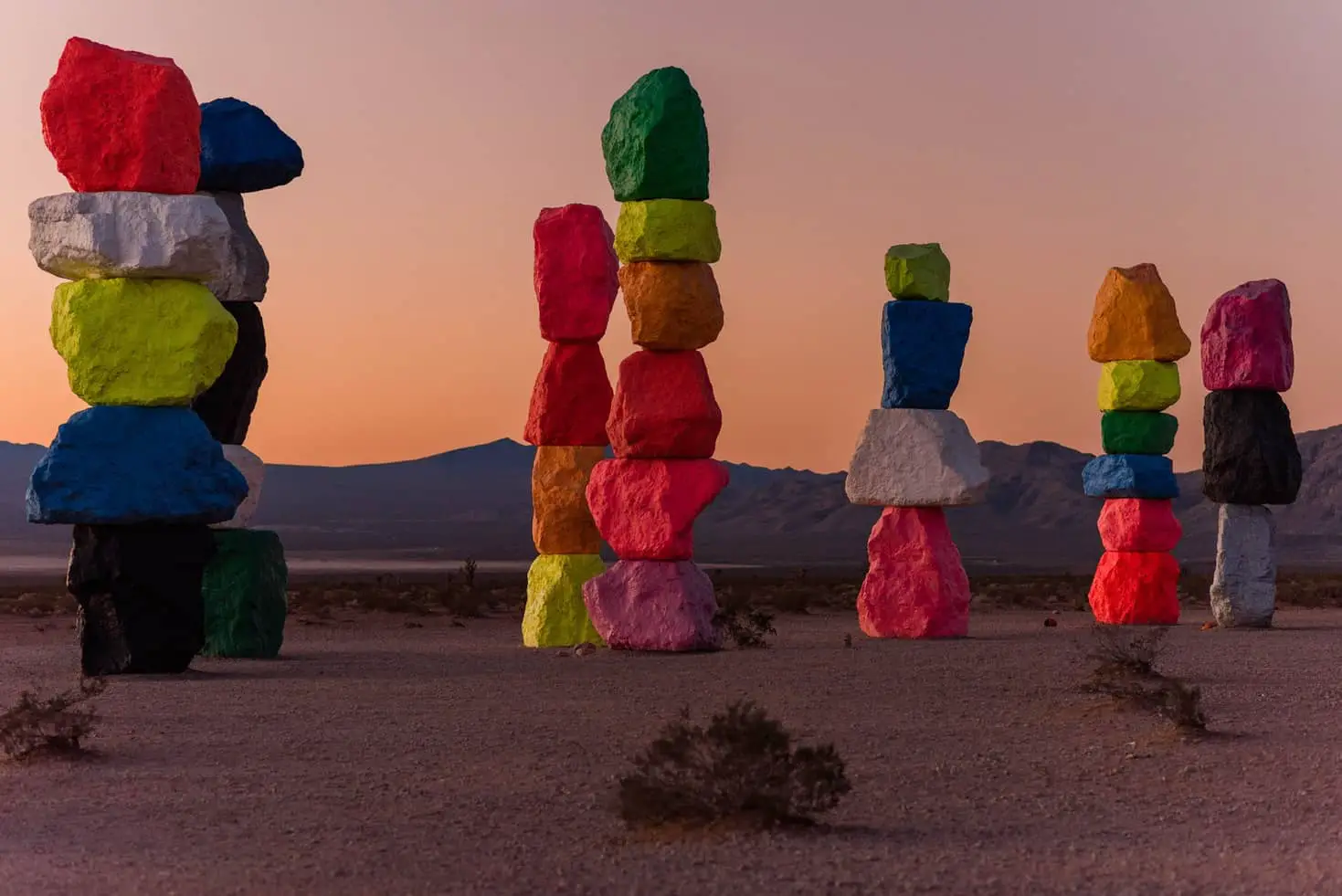 Seven stone sculptures in the desert
