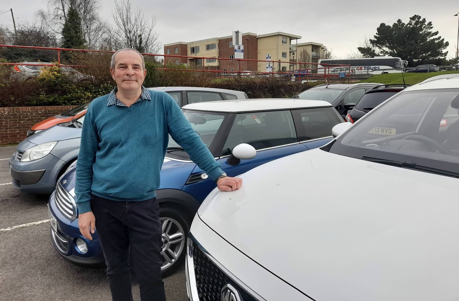 Alan standing by his car in the Riverside Centre car park