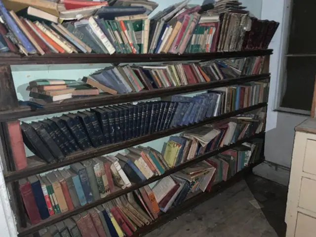 Books left on shelves inside Norris Castle