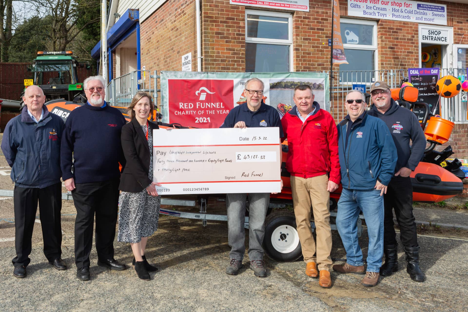 Red Funnel handing over the giant cheque to IW Independent Lifeboats crews