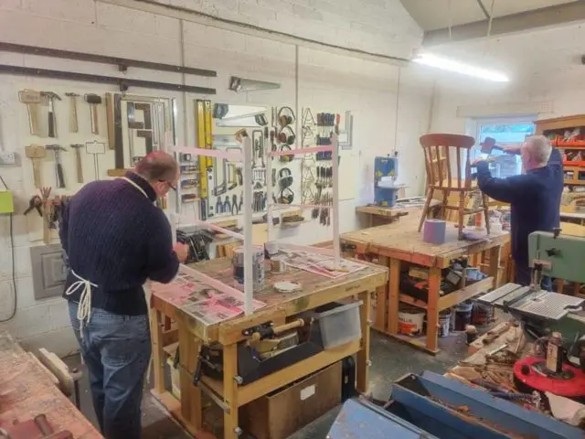 Cowes Men's Shed members getting down to business