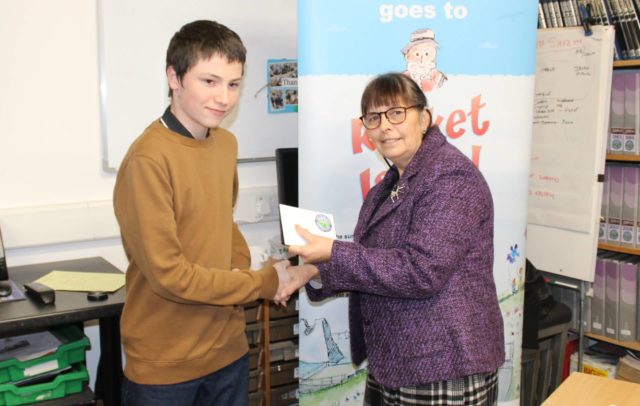 Liam Cox receiving his award from Helen Blake, Wight Aviation Museum Chairperson