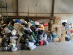 Piles of Donations for Mad-aid