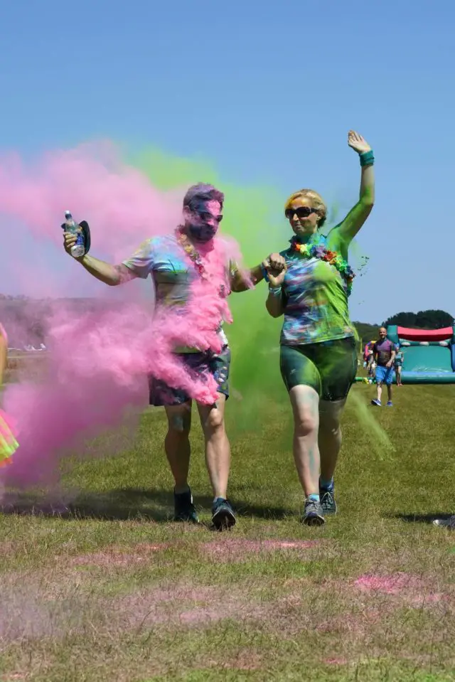 Two people taking part in the Rainbow Run