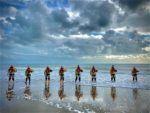 Sandown and Shanklin Independent Lifeboat Crew lined up on the beach for Volunteers Week photo
