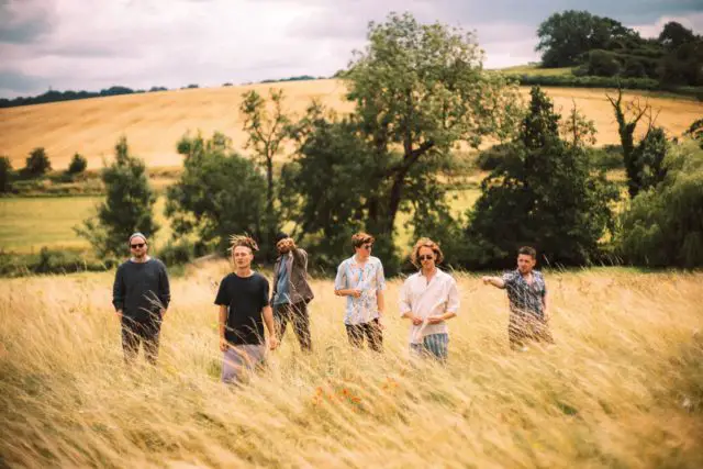 Bare Jams band in a field