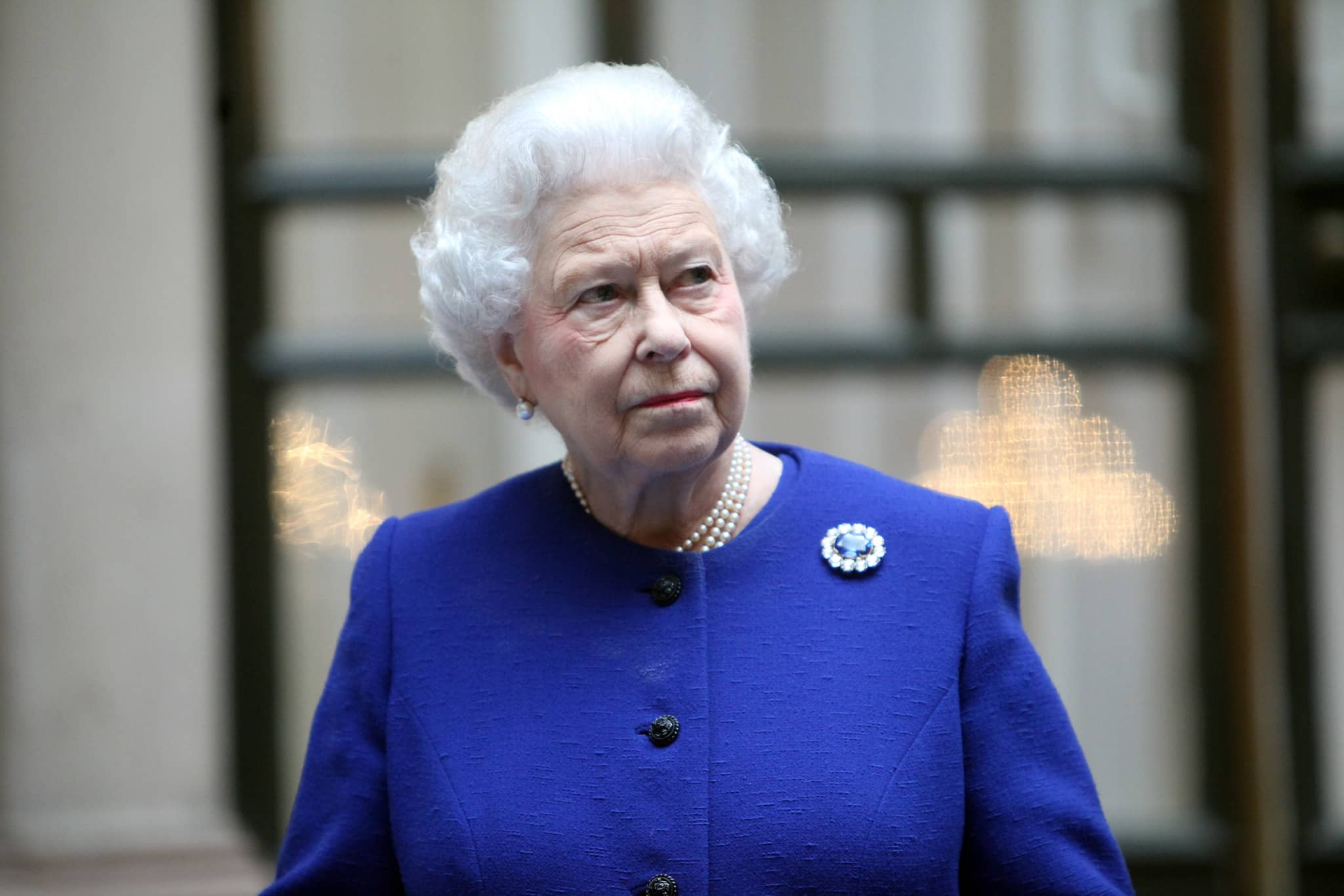 HM The Queen, dressed in royal blue