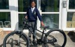 Minari Fernando, of Nine Acres Primary School, Newport, with her new mountain bike (February challenge