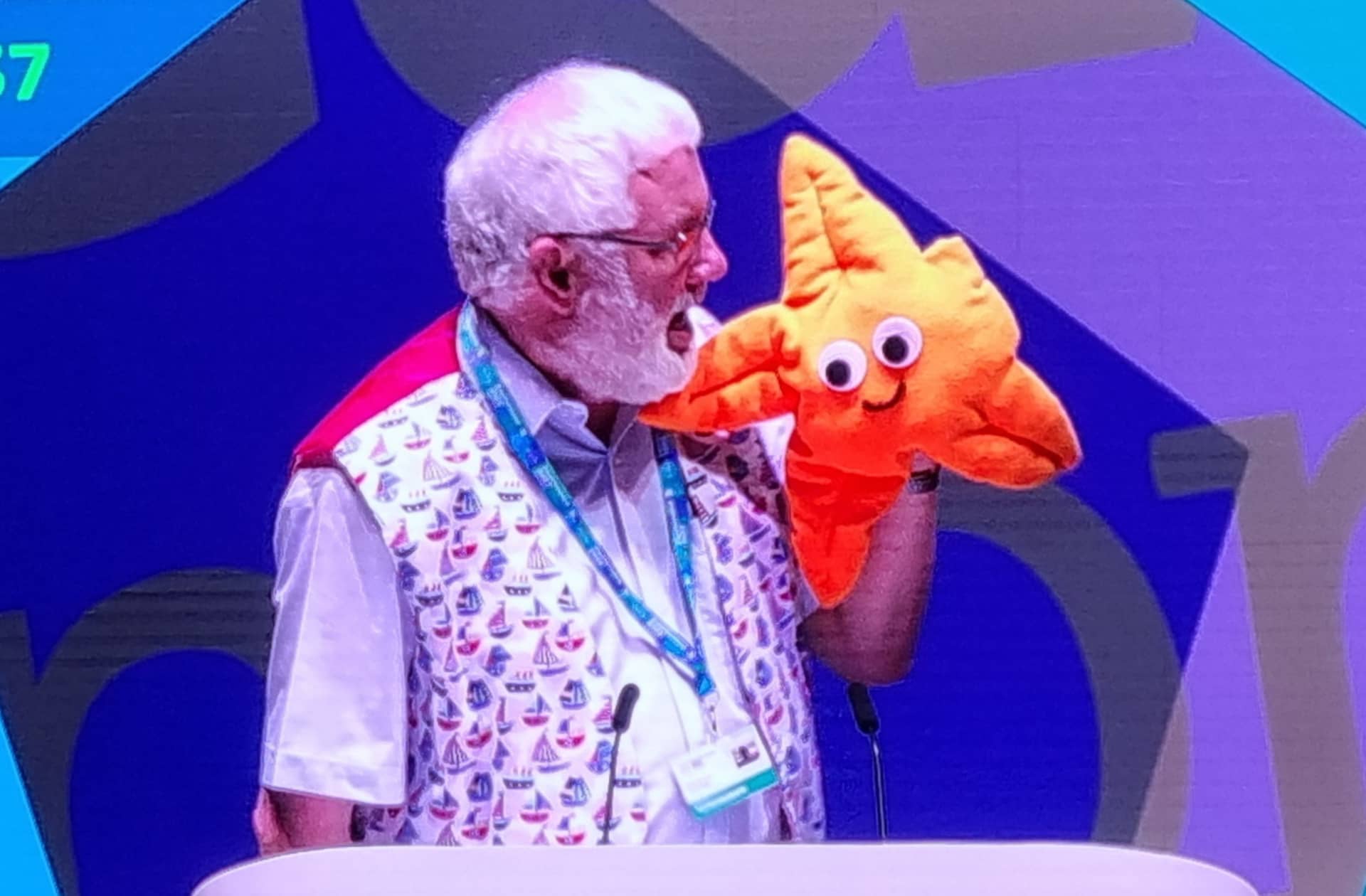 Peter Shreeve giving the Coastal schools speech with a starfish puppet