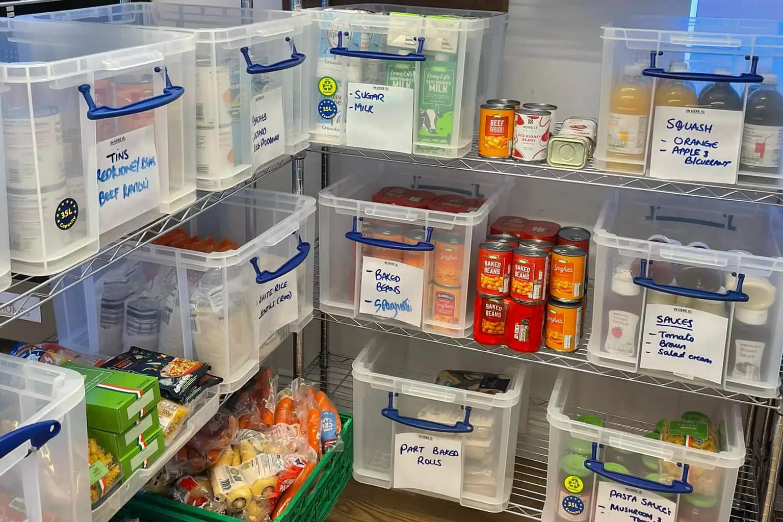 Shelves with food on at East Cowes Community Pantry