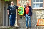 Nigel Phillips and Ian Poulter with the new defibrillator