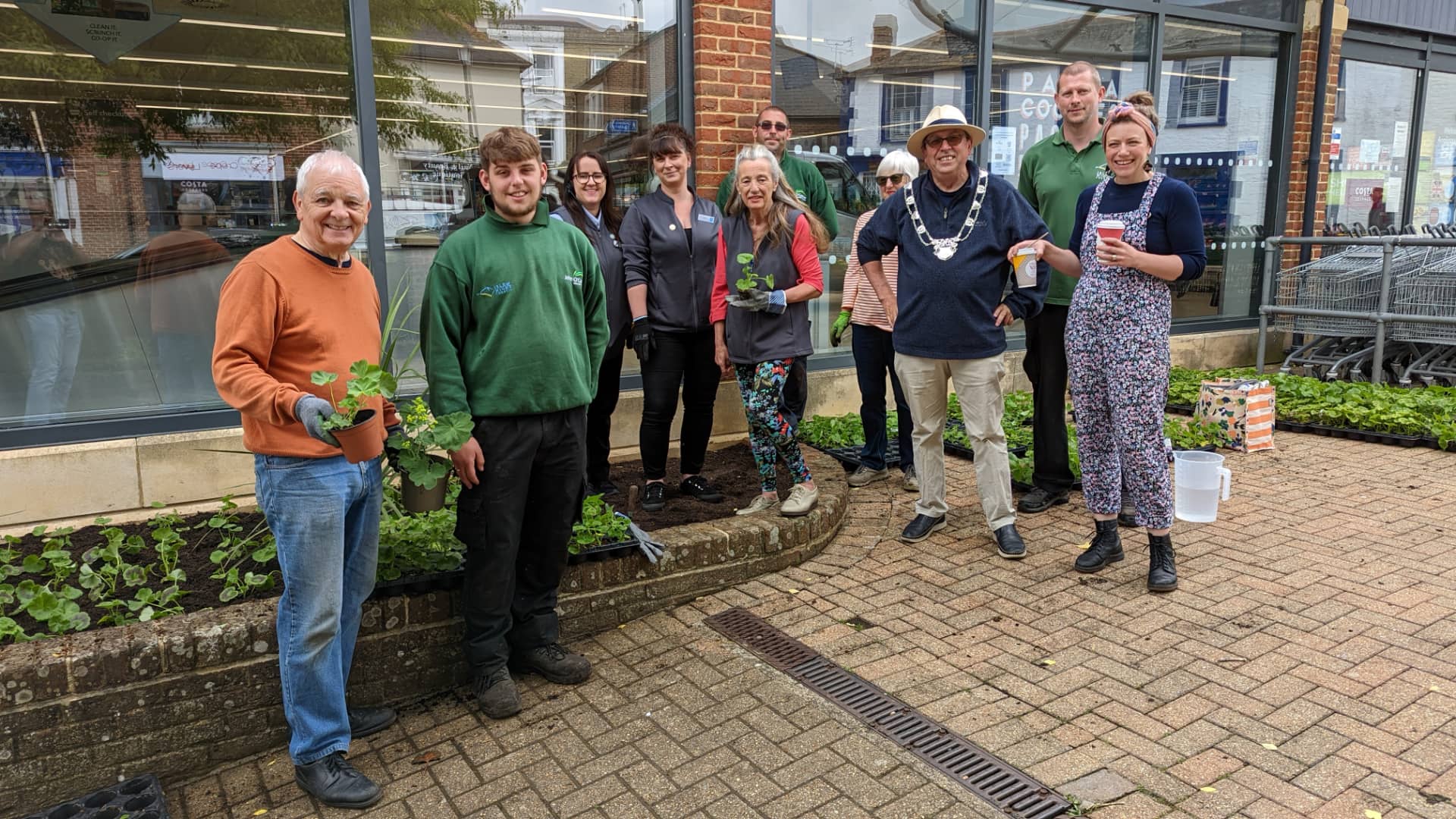 olunteers from the Vernon Square Conservation Society and Co-op staff working by Ryde Co-op meet the mayor and deputy mayor of Ryde, Cllr Michael Lilley and Cllr Jenna Sabine, plus staff from John O'Conner and the Isle of Wight Council.