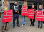 Welfare officers with tabards