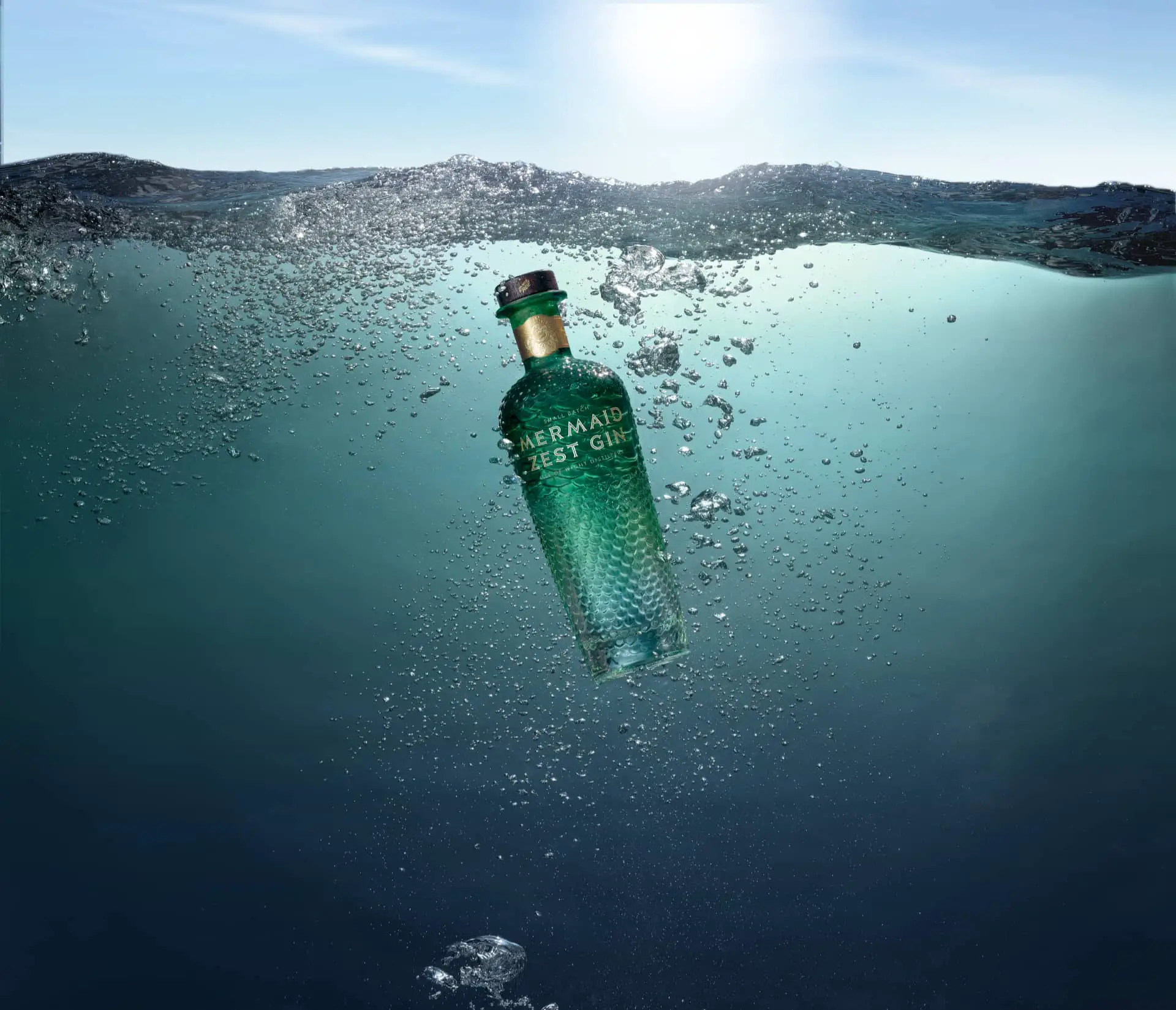 Mermaid Zest bottle in the sea