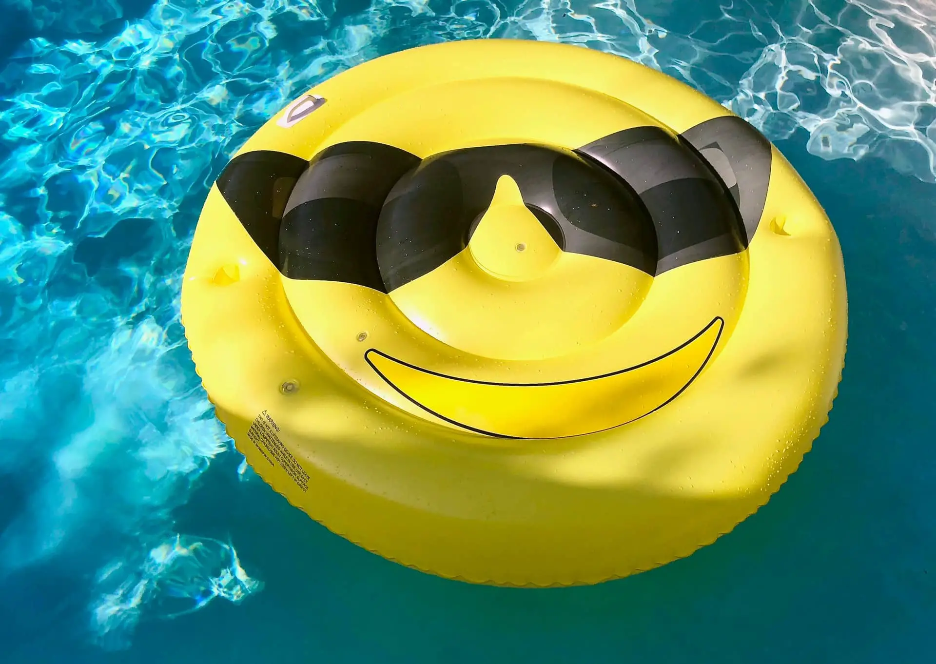 Swimming pool with smiley inflatable