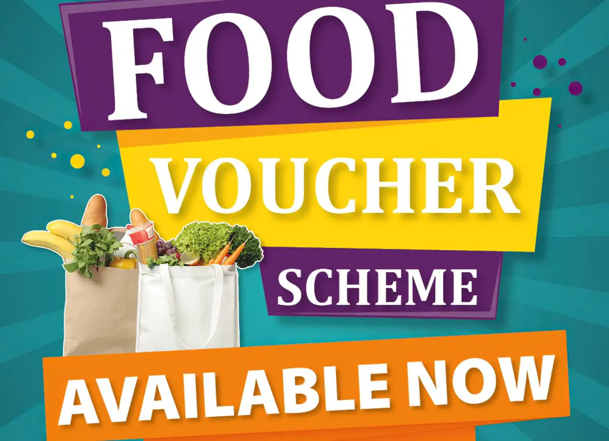 Poster for Food voucher scheme showing those words and two bags of food
