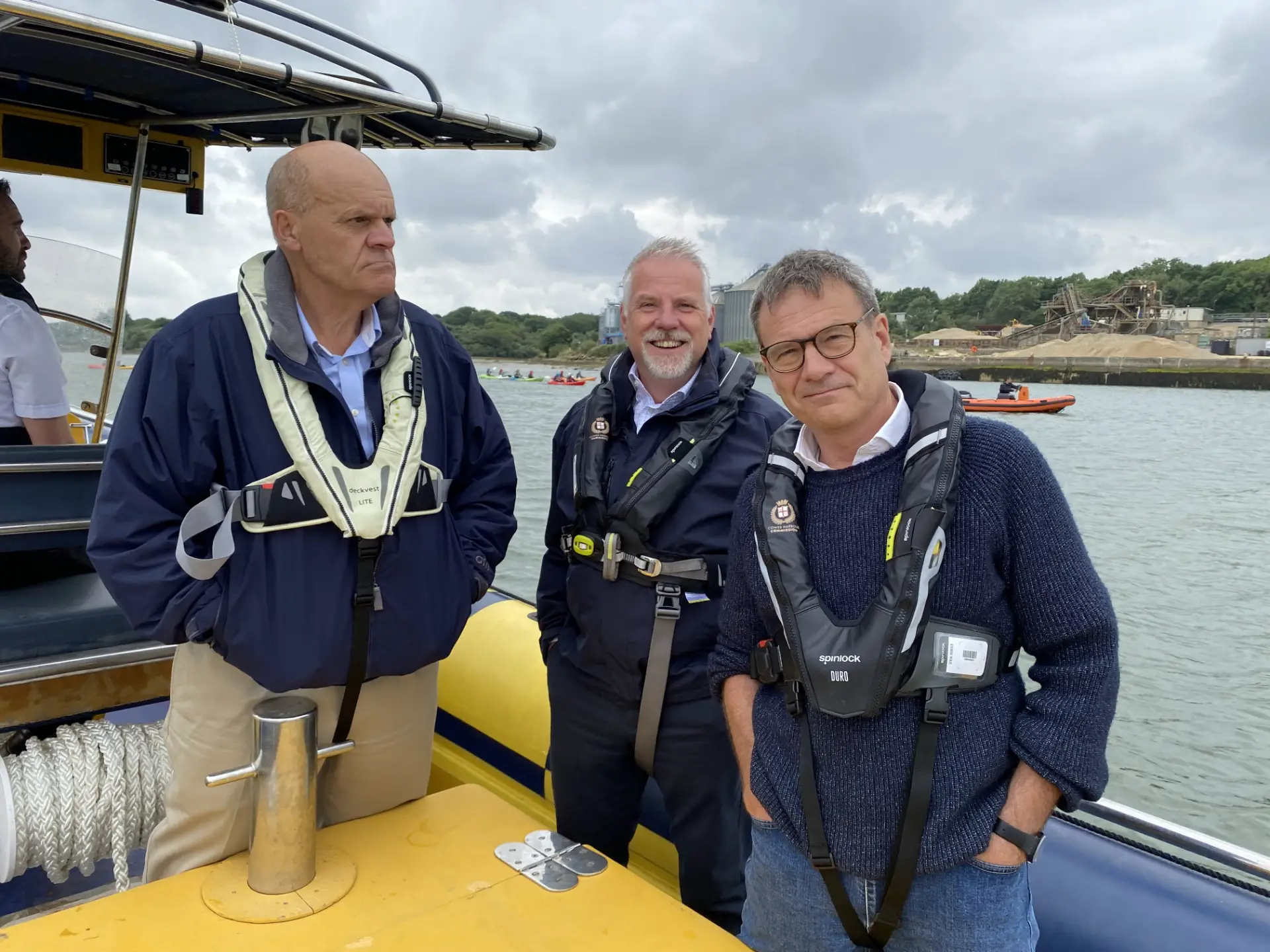 Phil Hagen and Gary Hall from Cowes Harbour Commission with Bob Seely