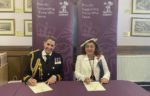 Cdre Mel Robinson CBE ADC RNR, Commander of the Maritime Reserves and Councillor Lora Peacey Wilcox signing the Armed Forces Covenant last month.