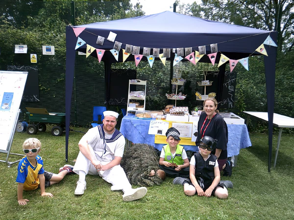 Children and adults at St Cats Summer Fair