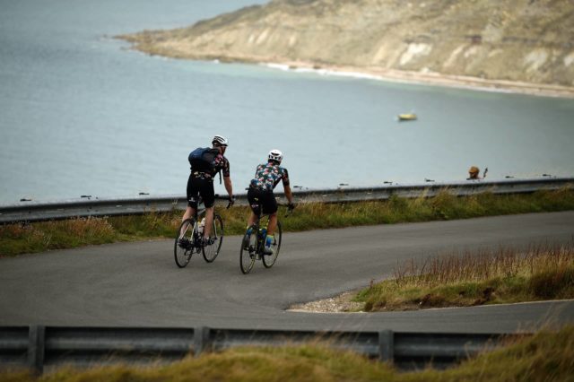 Cyclists on road at Needles Old Battery - National Trust Images, John Millar