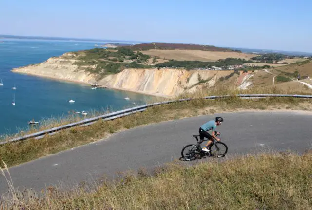 Dan Martin riding up to The Needles Old and New Battery