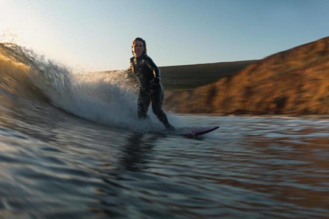 Madi Dew riding the waves © Jon Line