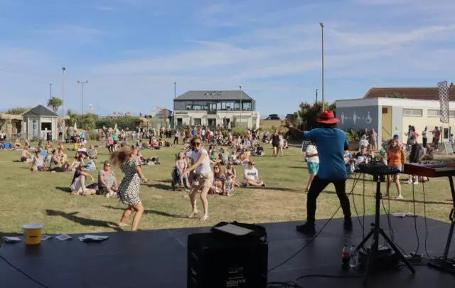 People dancing to Derek Sandy at Sandown Carnival 2022 by Paul Coueslant