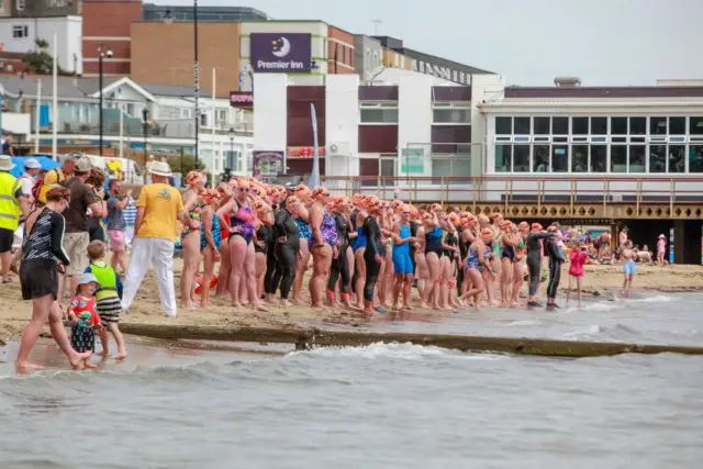Female swimmers ready to start the race by Mandy Meadows