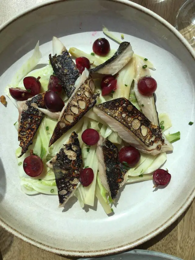 Salted and flambéed mackerel, seasoned fennel and red currants