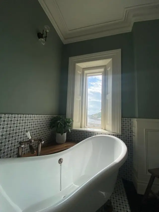 View through the window from the freestanding bath