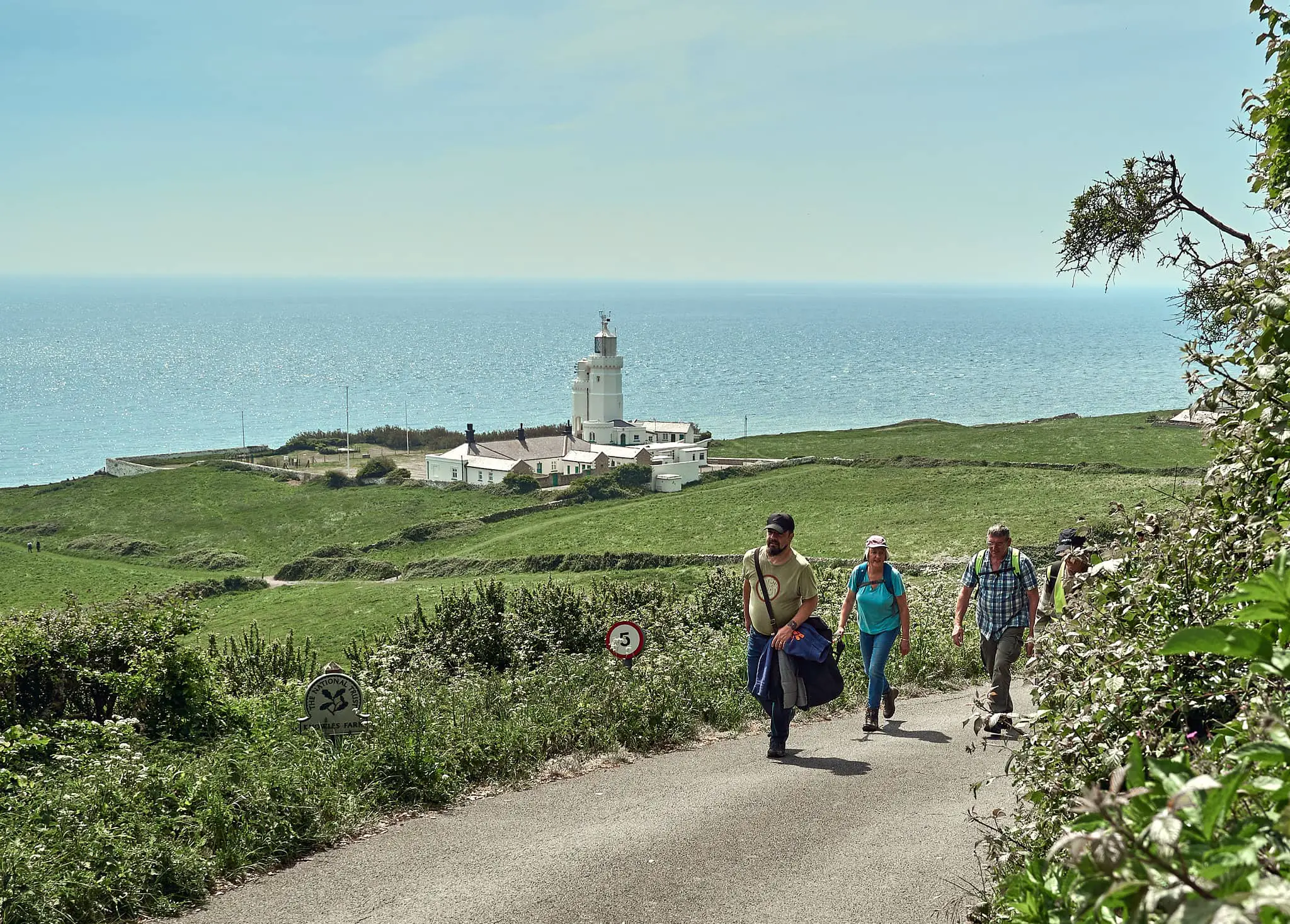 Walkers on the road from St Catherine's Lighthouse - Visit Isle of Wight