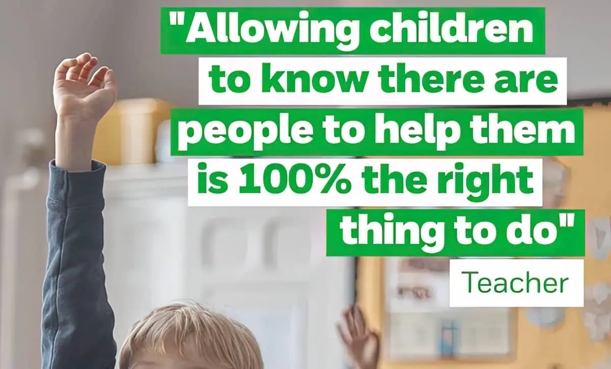 Children with hands up in class with text on top which says "allowing children to know there are people to help them is 100% the right thing to do"