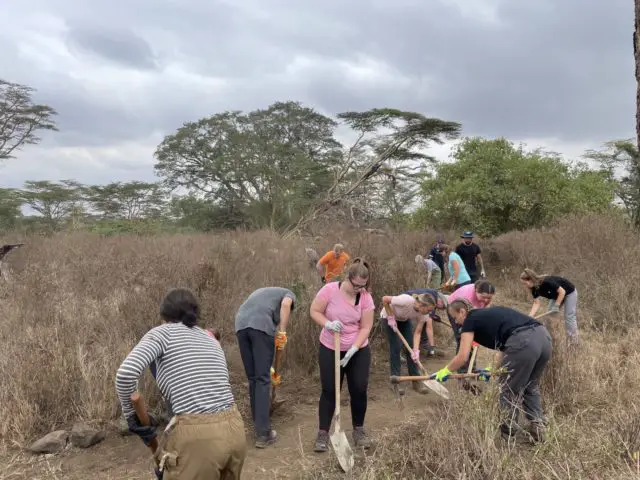 Cowes Enterprise College students in Kenya - clearing scrubland
