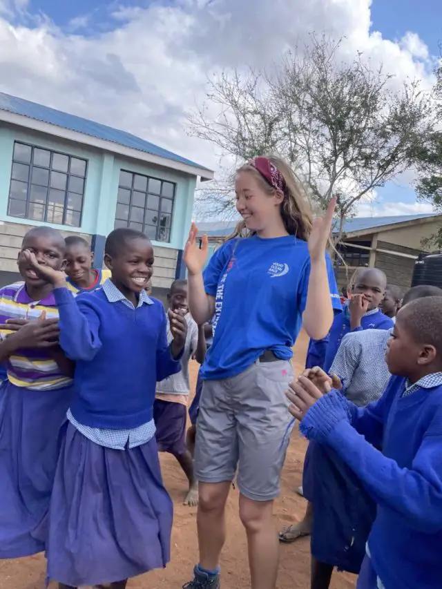 Cowes Enterprise College students in Kenya - playing with Kenyan pupils