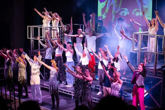 Ryde School pupils taking part in a musical production