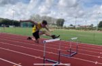 Jacob going over the hurdles