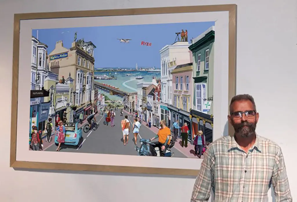Nicholas Martin with his painting ‘Ryde, Gateway to the Island’ painting showing view down Union Street, with Portsmouth in the background
