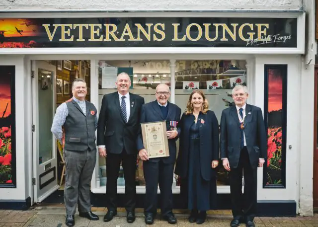 Roy Hayward and others outside the Veteran's Lounge