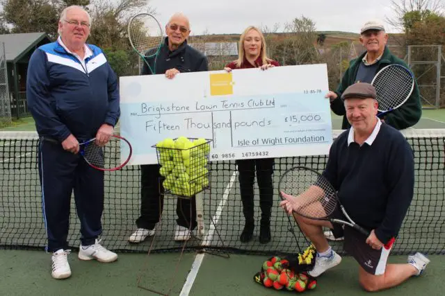 Brighstone Tennis Club receiving their cheque