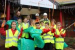 Mr Pratt and his class of litter pickers with Dave Wallis and Kev Legg