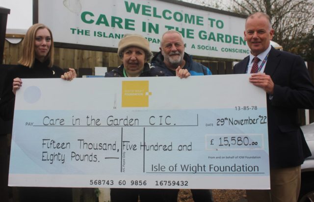 Care in the Garden receiving Foundation Cheque