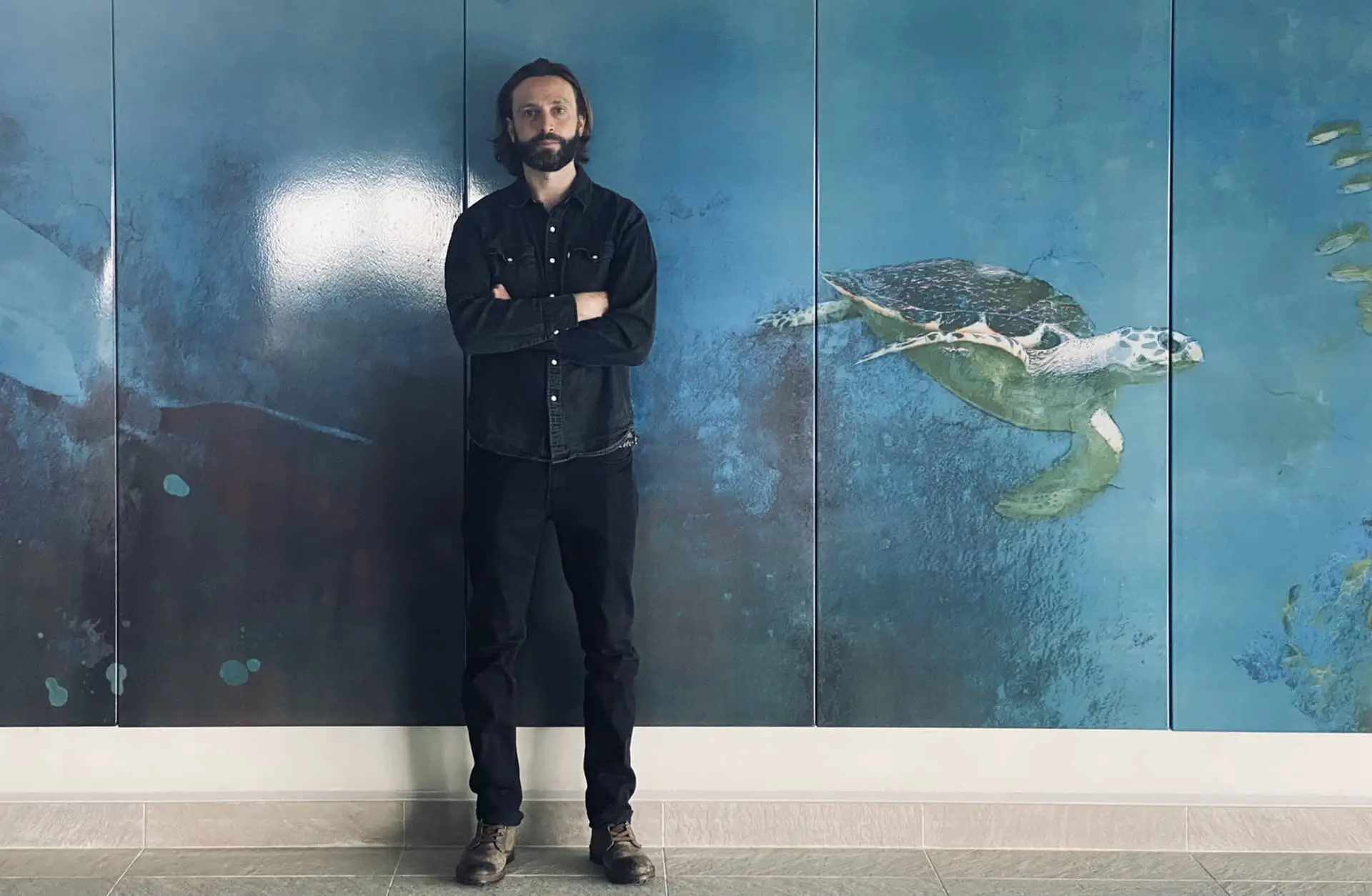 Jacob Light with his swimming pool mural