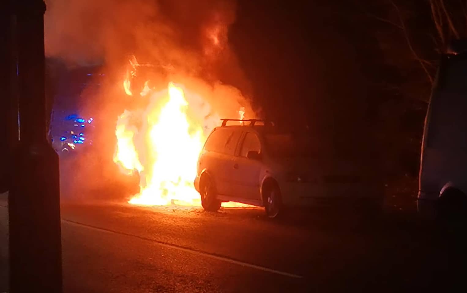 Van on fire, captured by John Cattle