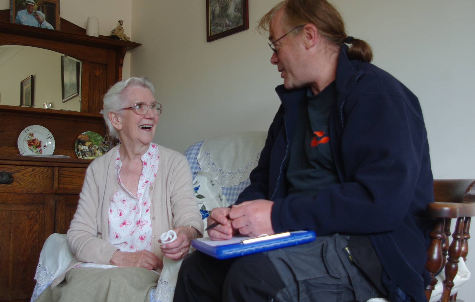 Ray from The Footprint Trust with an older Resident