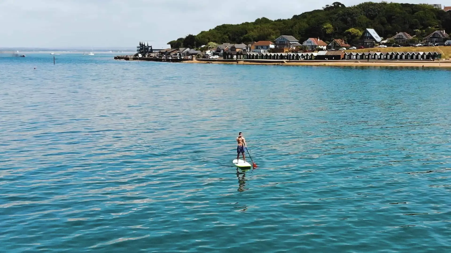 Person on a Standup Paddleboard in the bay at Colwell